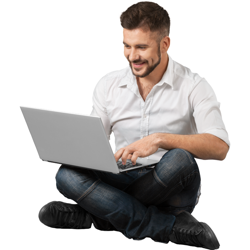 happy man holding a laptop